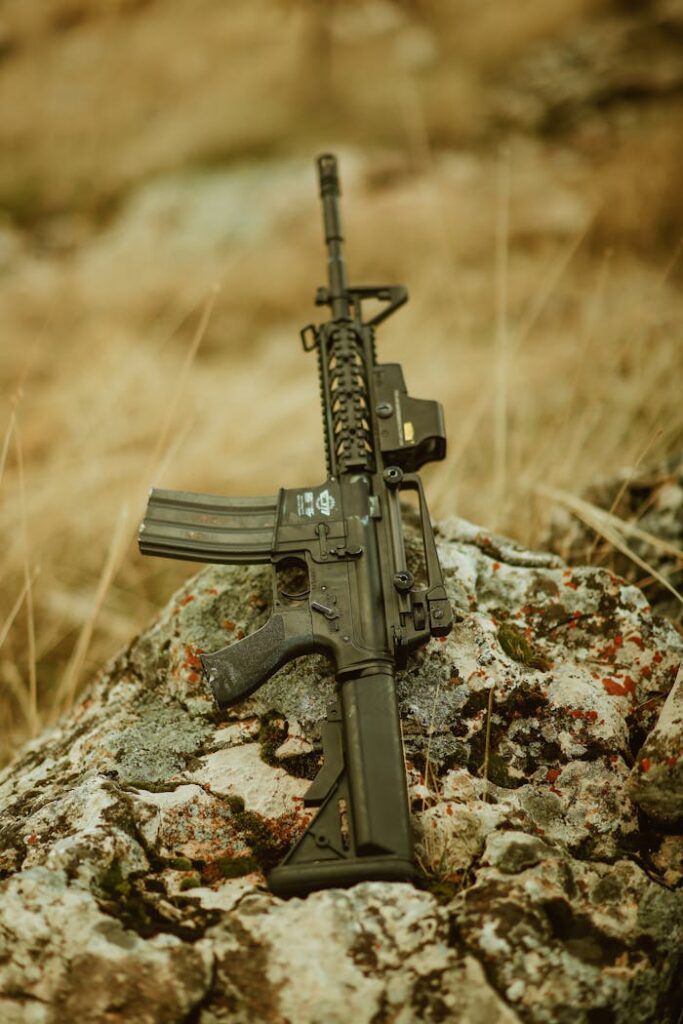 M4 carbine rifle resting on rocks, showcasing military weaponry in Türkiye's natural setting.